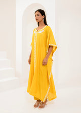 Kaftan adorned with intricate ivory thread embroidery