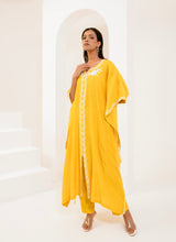 Kaftan adorned with intricate ivory thread embroidery