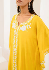 Kaftan adorned with intricate ivory thread embroidery