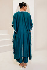 Teal blue kaftan adorned with intricate ivory thread embroidery