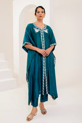 Teal blue kaftan adorned with intricate ivory thread embroidery