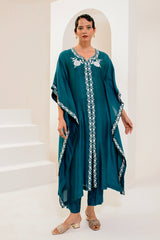 Teal blue kaftan adorned with intricate ivory thread embroidery