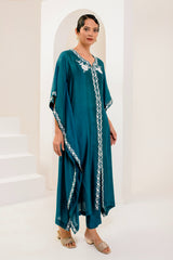 Teal blue kaftan adorned with intricate ivory thread embroidery