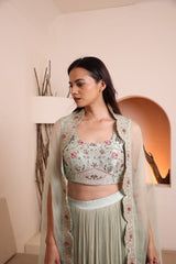 Siege green hand embroidered blouse with georgette pleated skirt and embroidered cape