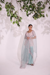 Elegantly embroidered set features floral motifs in resham aari , sequin, cut dana and bead work