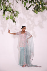 Elegantly embroidered set features floral motifs in resham aari , sequin, cut dana and bead work