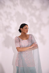 Elegantly embroidered set features floral motifs in resham aari , sequin, cut dana and bead work