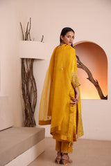 Yellow raw silk kurta embellished with hand embroidery dabka and zari work