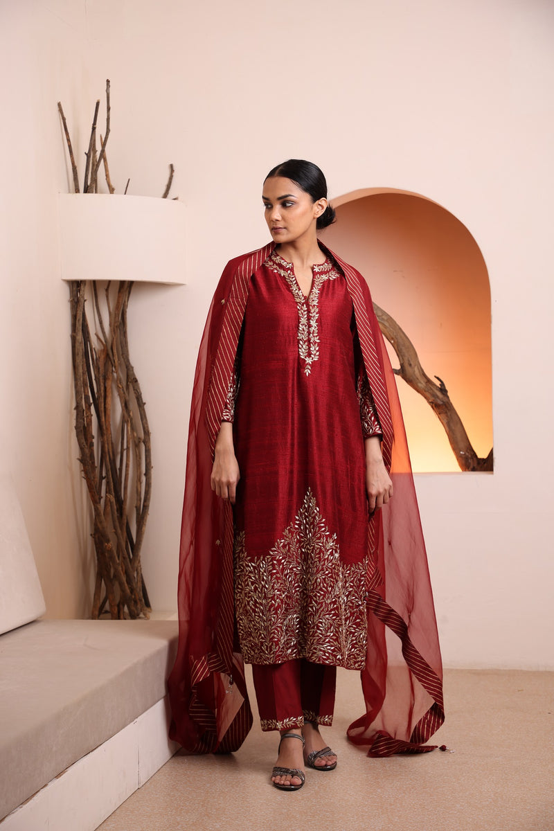 Wine raw silk kurta embellished with hand embroidery dabka and zari work